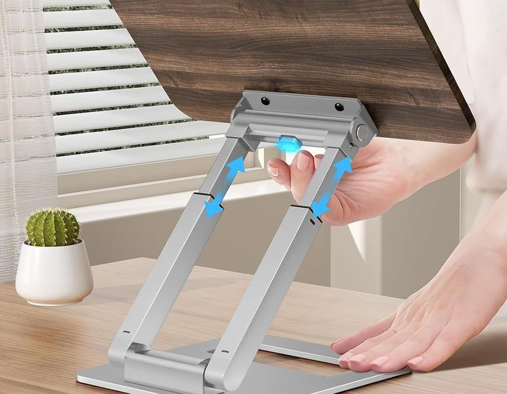 Pressing the button under the board to raise the telescoping arms